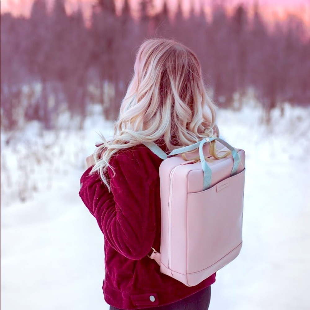 Pink backpack with laptop pouch
